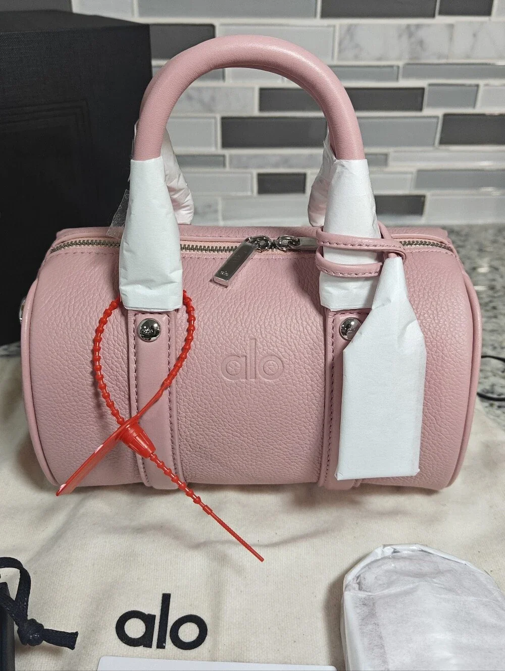 ALO Mini Voyage - Vintage Pink Leather